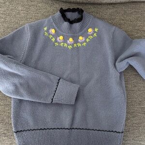 Chic Embroidered Blue Sweater with Floral Accents